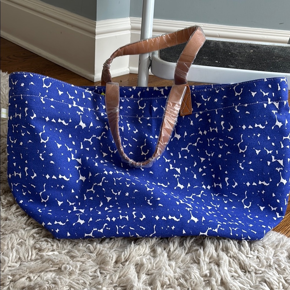 striking Blue graphic Tote with brown leather handles
